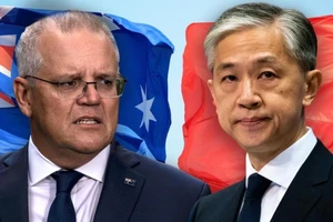 Thủ tướng Úc Scott Morrison (trái) và người phát ngôn Bộ Ngoại giao Trung Quốc Uông Văn Bân. Ảnh: 9NEWS
