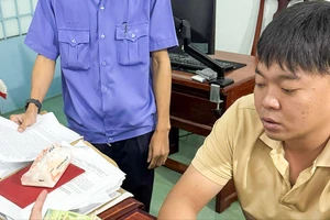 1 thư ký TAND tỉnh An Giang bị bắt khi đang nhận tiền 'giúp giảm án'