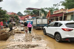 Lũ ống bất ngờ đổ về trong đêm ở xã Minh Lương (Lào Cai) đã làm ba người chết và mất tích. Ảnh: VĂN MINH