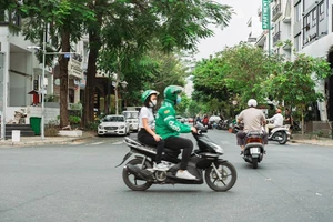 Bộ Công Thương yêu cầu Grab làm rõ cơ sở nào để thu phụ phí nắng nóng