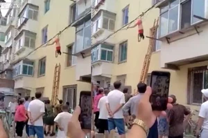 Trốn vợ tình nhân, cô bồ nhí kẹt trên dây điện