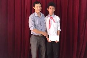 Cảm phục cậu bé lớp 7 cứu sống 2 người trong lũ dữ