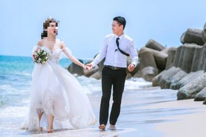 Nam nhân viên chiếm đoạt tiền tỉ, thuê hotgirl chụp ảnh cưới