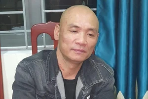 Trần Quang Trung tại cơ quan công an. Ảnh: CA