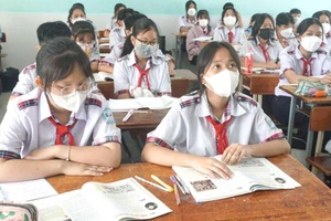 Học sinh Trường THCS Lý Tự Trọng (quận Gò Vấp) trong một tiết học. Ảnh: NGUYỄN QUYÊN