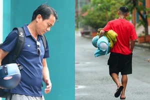 HLV Phùng Thanh Phương và cầu thủ thất thểu rời Thành Long khi cái tên Sài Gòn FC bị xóa sổ. Ảnh: QUỐC AN