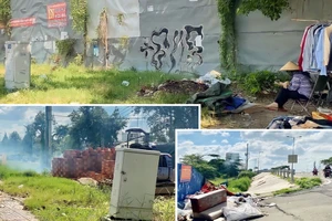 Hiểm họa cháy nổ tủ điện từ việc đốt rác. Ảnh: TUYẾT NHUNG