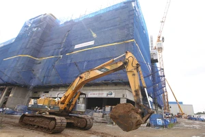 Đa số đại biểu tán thành mức đặt cọc 5%-10% khi mua nhà ở hình thành trong tương lai. Ảnh minh họa: Q.HUY