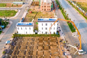 Luật Kinh doanh bất động sản mới chỉ cho phép chủ đầu tư huy động vốn đến 50% giá trị sản phẩm. Ảnh minh họa: Q.HUY