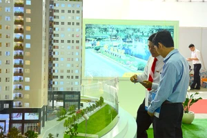 Mở rộng quy định để tạo điều kiện thuận lợi cho Việt kiều mua nhà cũng như đầu tư nhà đất tại Việt Nam. Ảnh minh họa: Q.HUY 