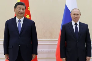 Chủ tịch Trung Quốc Tập Cận Bình (bên trái) và Tổng thống Nga Vladimir Putin. Ảnh: AP 