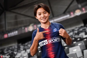 Bóng hồng Trung Quốc trở lại tuyển sau 11 tuần bị kẹt ở Vũ Hán