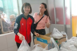 Cơm có thịt của Trang…