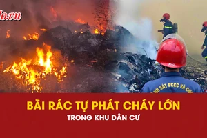 VIdeo: Cháy bãi rác tự phát hàng trăm mét vuông trong khu dân cư ở TP.HCM