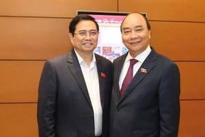 Chiều nay, Quốc hội sẽ nghe và thảo luận về việc miễn nhiệm Thủ tướng Chính phủ đối với ông Nguyễn Xuân Phúc (phải). Ảnh: NHƯ Ý