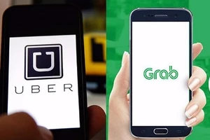 Grab lên tiếng về việc mua lại Uber