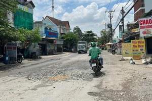 Phụ phí của Grab có phải là một hình thức tăng giá cước? 