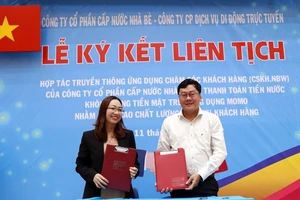 Cấp nước Nhà Bè ký kết hợp tác truyền thông thanh toán không tiền mặt
