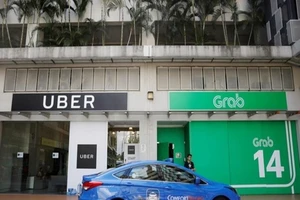 Có thể mở phiên điều trần vụ Grab mua Uber