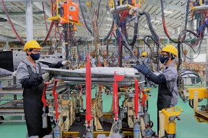 Thấy gì qua việc Việt Nam được nâng triển vọng tín nhiệm lên mức tích cực?