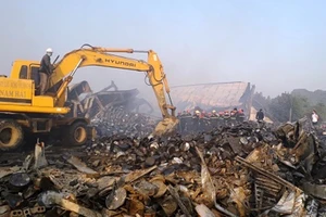 Tiếp tục tìm kiếm phần còn lại của thi thể nữ công nhân