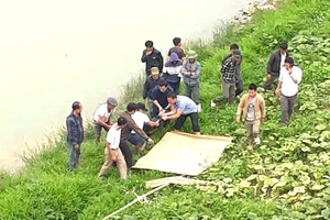 Thi thể nam thanh niên trôi trên sông Chu