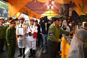 Bộ trưởng Bộ Công an Tô Lâm thăng cấp hàm cho đại úy hy sinh