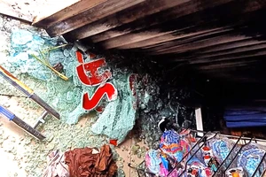 Hiện trường vụ tạt xăng nhằm thiêu đốt cả gia đình. Ảnh: T.H