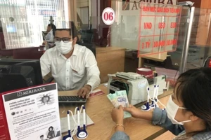 Agribank miễn, giảm lãi, hạ lãi suất cho 27.500 khách hàng