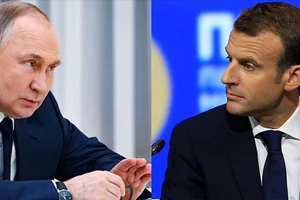 Tổng thống Nga Vladimir Putin (trái) và người đồng cấp Pháp Emmanuel Macron. Ảnh: AA
