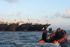 Canada, Nhật ra tuyên bố kêu gọi Trung Quốc tuân thủ phán quyết về Biển Đông. Ảnh: AP