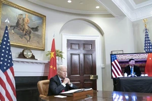 Cuộc họp thượng đỉnh trực tuyến giữa Tổng thống Mỹ Joe Biden và Chủ tịch Trung Quốc Tập Cận Bình. Ảnh: BLOOMBERG