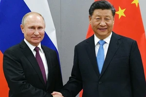 Chủ tịch Trung Quốc Tập Cận Bình (phải) và Tổng thống Nga Vladimir Putin. Ảnh: AP