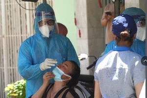 TP.HCM: 2 con của bệnh nhân COVID-19 dương tính SARS-CoV-2