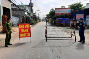 TP.HCM: Cách ly cha mẹ và con 2 ca nghi COVID-19 ở quận 12