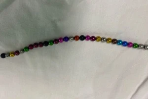 Tiểu ra máu do nhét 30 viên bi kim loại vào niệu đạo