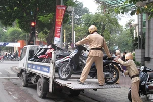 Xe vi phạm bị CSGT tạm giữ, hư hỏng ai bồi thường? 