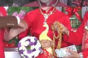 Sốc: Cha tặng con gái hơn 11 kg vàng, 50.000 USD trong ngày cưới