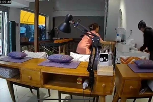Triệu tập nam thanh niên đánh cô gái trong tiệm spa
