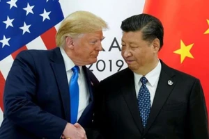 Tổng thống Mỹ Donald Trump (trái) xác nhận sắp cùng Chủ tịch Trung Quốc Tập Cận Bình (phải) ký thỏa thuận giai đoạn 1 của thỏa thuận thương mại. Ảnh: REUTERS