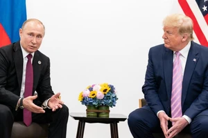 Tổng thống Nga Vladimir Putin (trái) và Tổng thống Mỹ Donald Trump. Ảnh: REUTERS