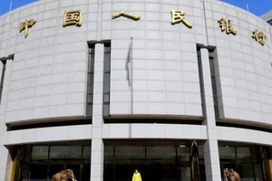 Ngân hàng trung ương Trung Quốc bơm 174 tỉ USD cứu thị trường tài chính. Ảnh: REUTERS