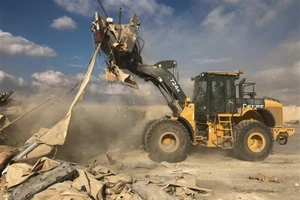 Căn cứ không quân Ayn al-Asad của Mỹ ở Iraq đổ nát sau khi bị Iran nã tên lửa. Ảnh: AP