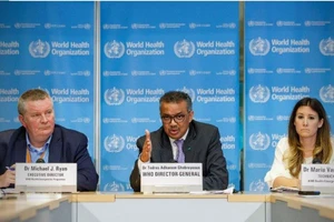 Các lãnh đạo WHO vừa tuyên bố COVID-19 là đại dịch tooàn cầu. Ảnh: AP