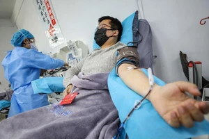 Việc xét nghiệm, điều trị COVID-19 ở Trung Quốc được miễn phí.