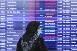 Malaysia cấm du khách nhập cảnh, cấm công dân ra nước ngoài. Ảnh: EPA