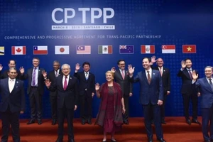 Đại diện các nước thành viên CPTPP tại lễ ký kết hiệp định ngày 8-3-2018 ở Santiago (Chile). Ảnh: BỘ NGOẠI GIAO CHILE/THE DIPLOMAT