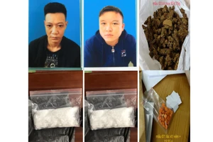 Hai nghi can Tuấn và Dũng bị bắt cùng tang vật. Ảnh: ĐH