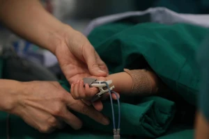 Tình hình sức khỏe mới nhất của cặp song sinh dính nhau 