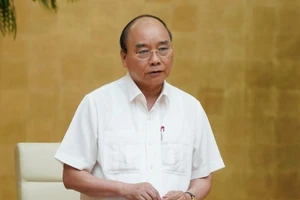 Thủ tướng: Người dân bình tĩnh hơn trước dịch COVID-19